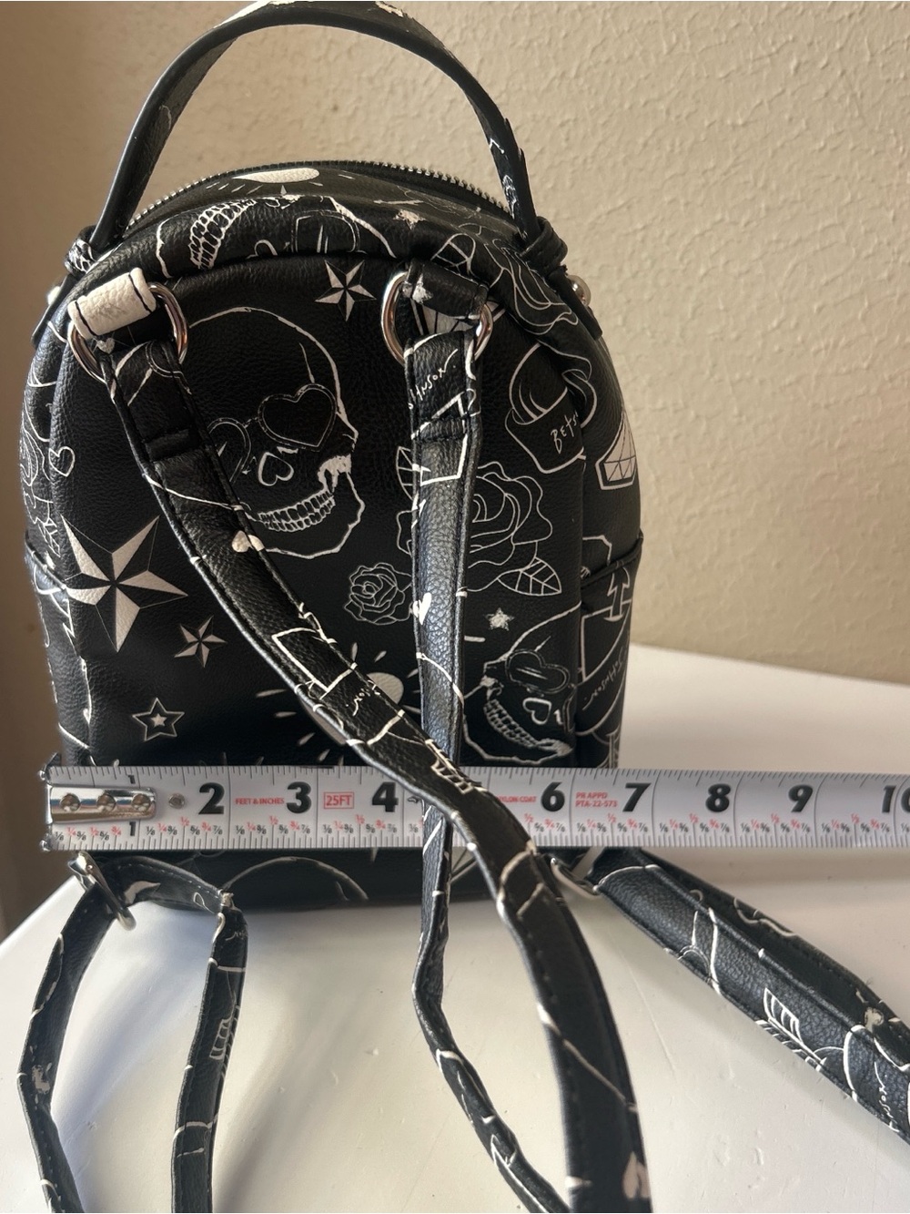 Betsey Johnson Bulldog skull tattoo print mini back pack. Damage on the handle - Picture 6 of 7